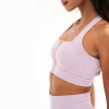 PILAR Αθλητικό κοντομάνικο κροπ τοπάκι μπουστάκι με φερμουάρ και χιαστί πλάτη