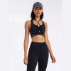 JESSICA Sports athletic crop top with criss cross neckline, criss cross back and strap tie at the waist effect