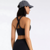JESSICA Sports athletic crop top with criss cross neckline, criss cross back and strap tie at the waist effect